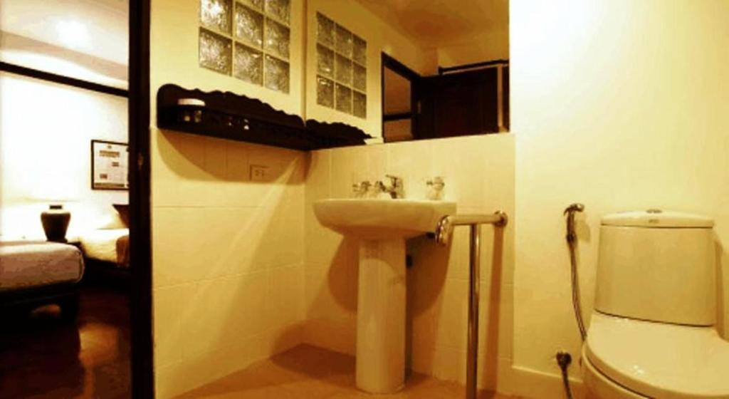 Cucumber Inn Suite Паттайя Номер фото